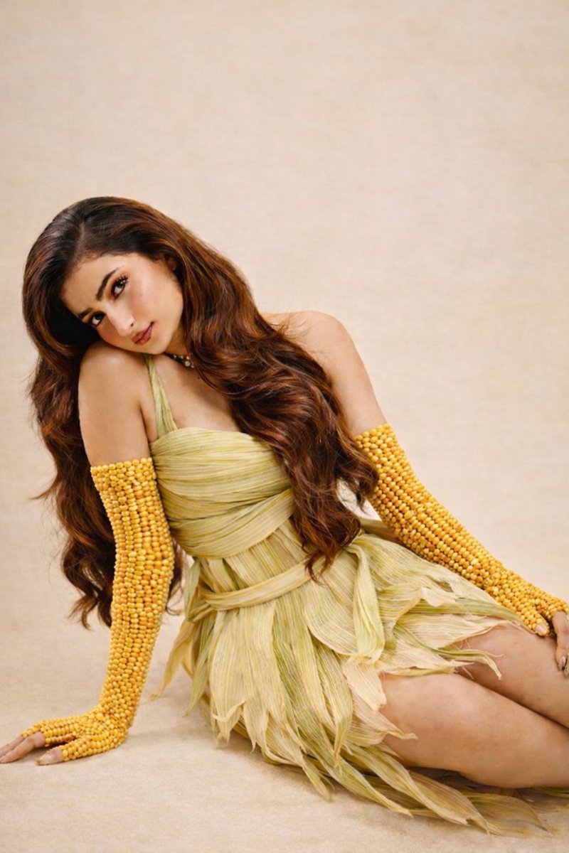 Corn Husk Dress Portrait in Studio Setting thumbnail 2