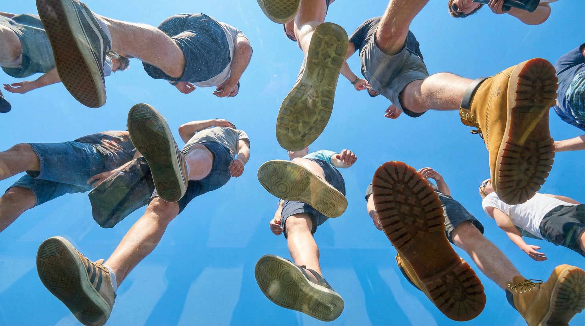 View from Under Transparent Plexiglass with Walking People - view 1
