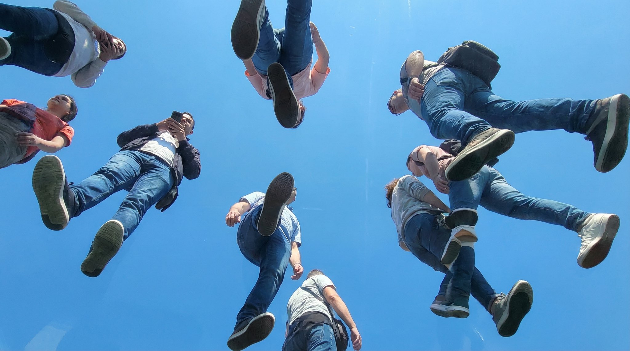 View from Under Transparent Plexiglass with Walking People thumbnail 4