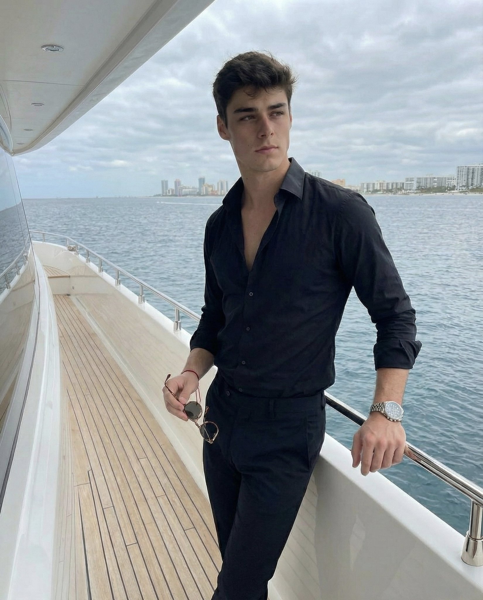 Luxury Lifestyle Portrait: Man on Waterfront with Seascape thumbnail 2