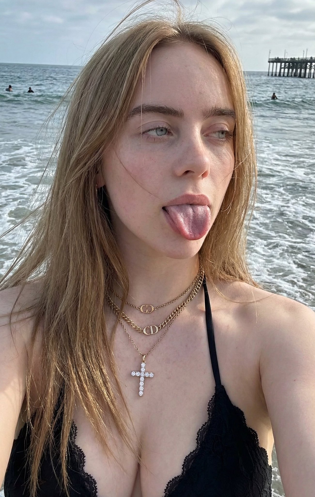 Playful Woman's Photorealistic Beach Selfie - view 1