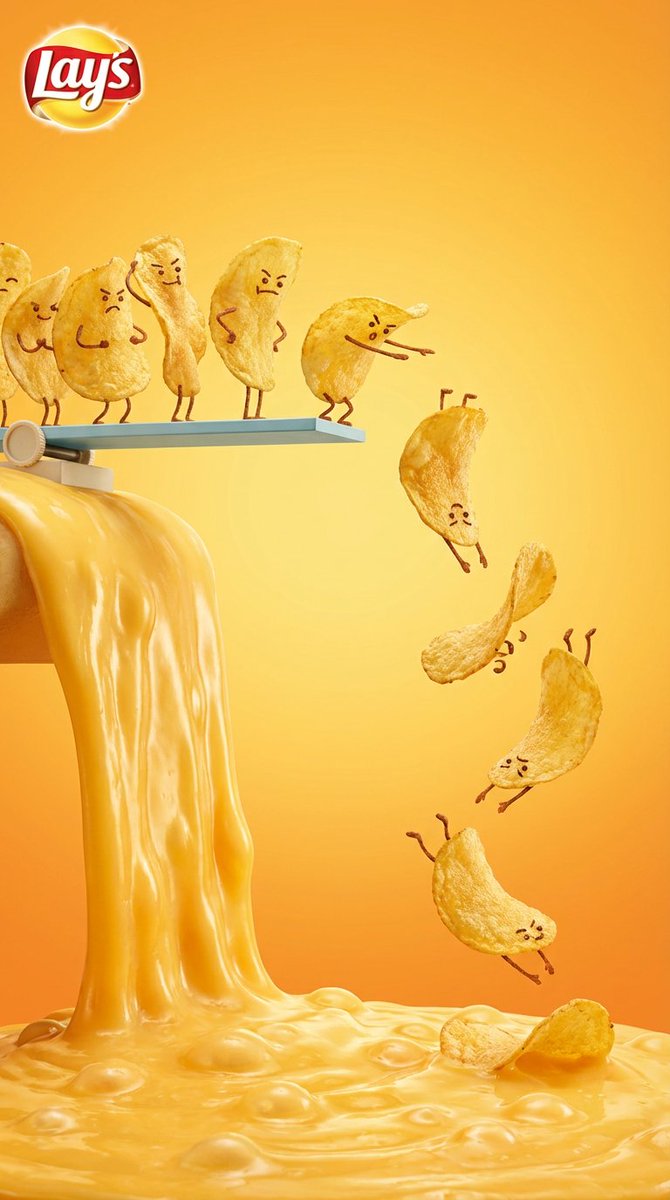 Playful Chips Diving into Molten Cheese Ad - view 1