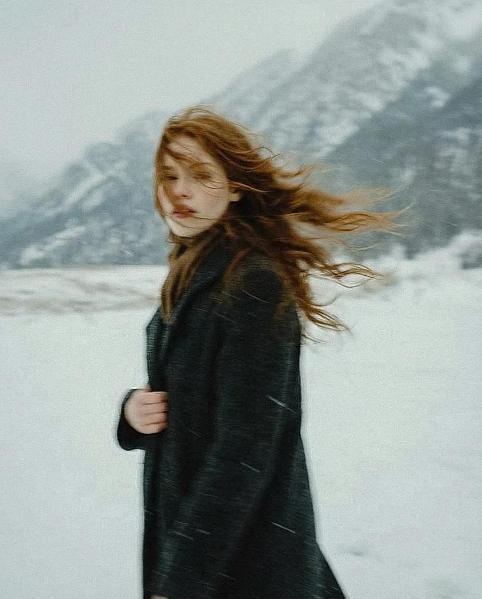 Cinematic Portrait of Young Woman in Snowy Landscape thumbnail 4