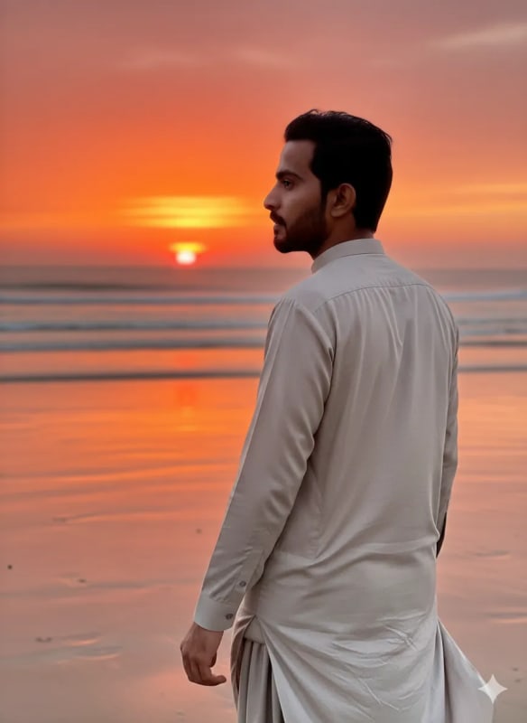 Serene Beach Portrait: Man in Shalwar Kameez at Sunset thumbnail 2